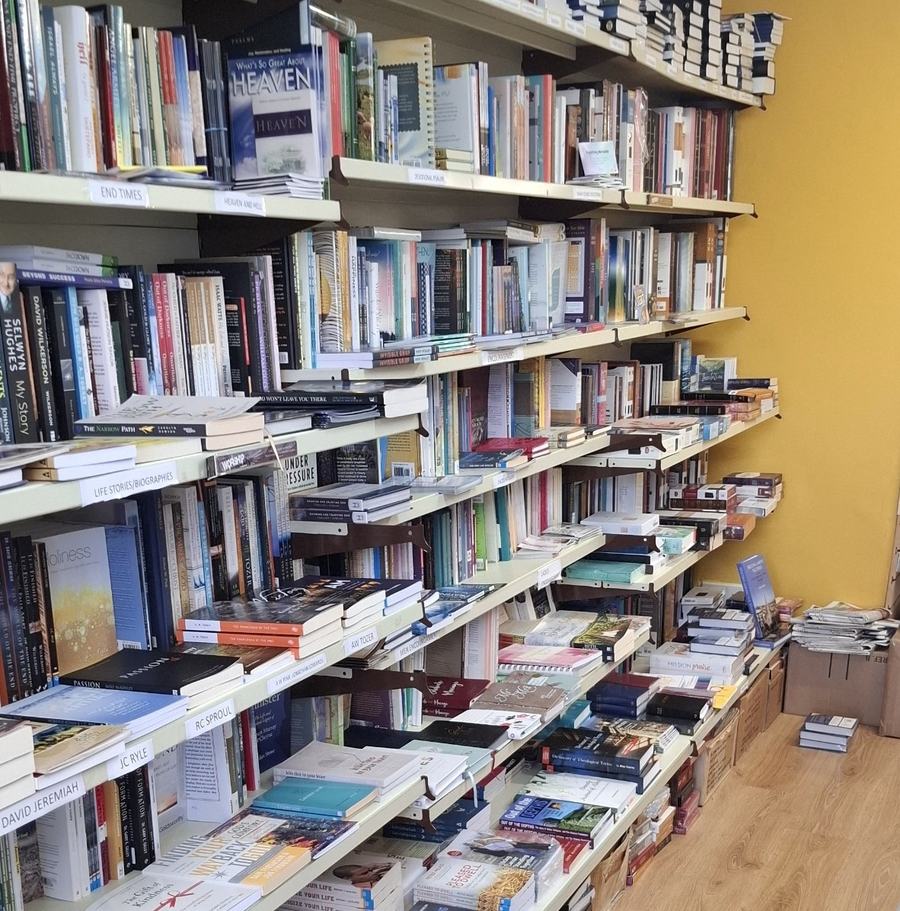Shelves filled with Christian books inside The Burning Bush